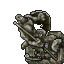broken lizard statue