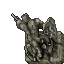 broken lizard statue